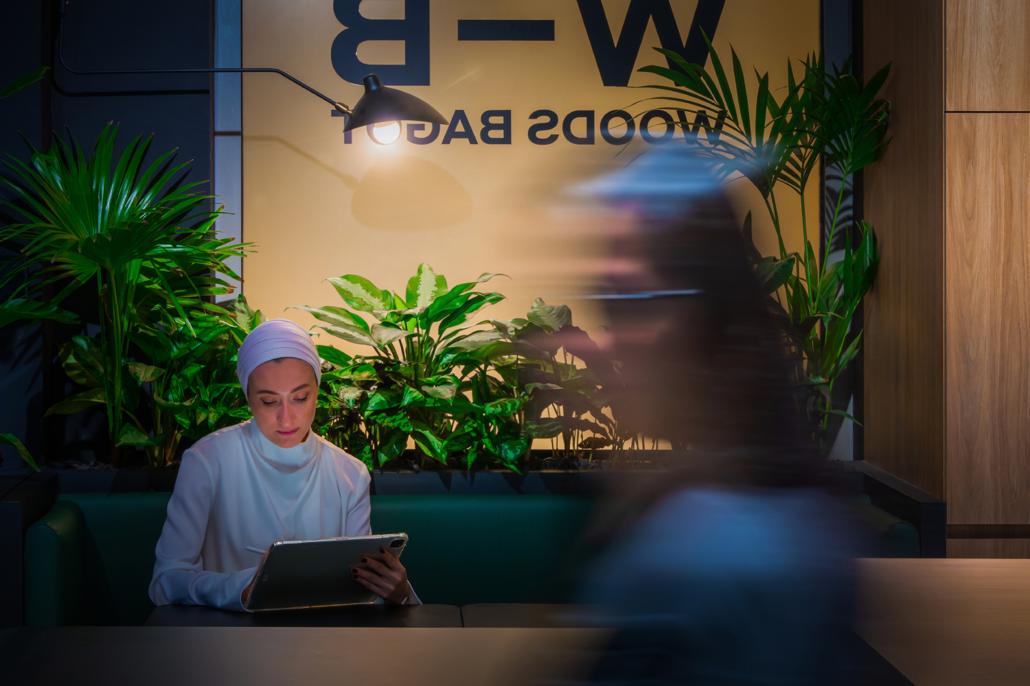 Woods Bagot Dubai - a lone worker in reception
